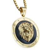 Pendentif tête de lion or.