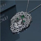 pendentif lion en acier couchée