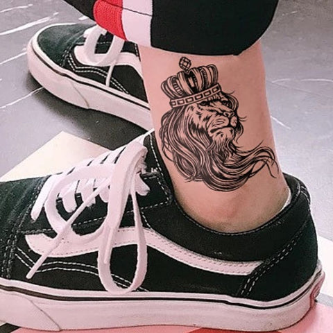 Tatouage Lion cheville.