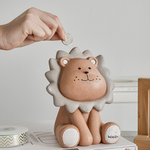 Tirelire lion enfant.