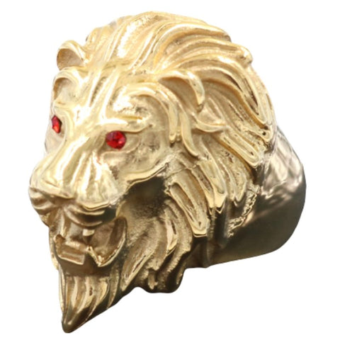 Bague tête de lion or et rouge.
