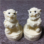 Deux-lions-statues-en-résine-blanc
