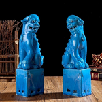 Statues Lions chinois en porcelaine.
