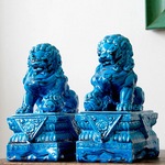 Statues Lions chinois bleu.
