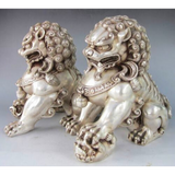 Statuette lion chinois de décoration.