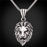 Collier chaine argent avec tête de lion.