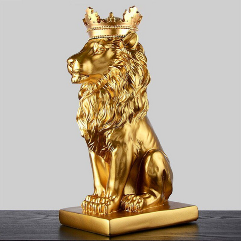 Statuette or lion avec couronne