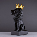Statue lion noir et couronne or.