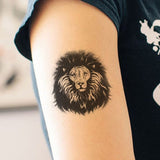 Tatouage Lion côté du bras.
