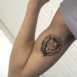 Tatouage Éphémère Lion sur biceps.