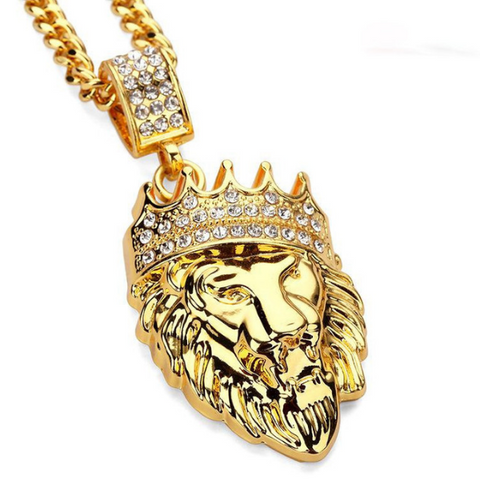 Collier tete de lion en or avec diamant.