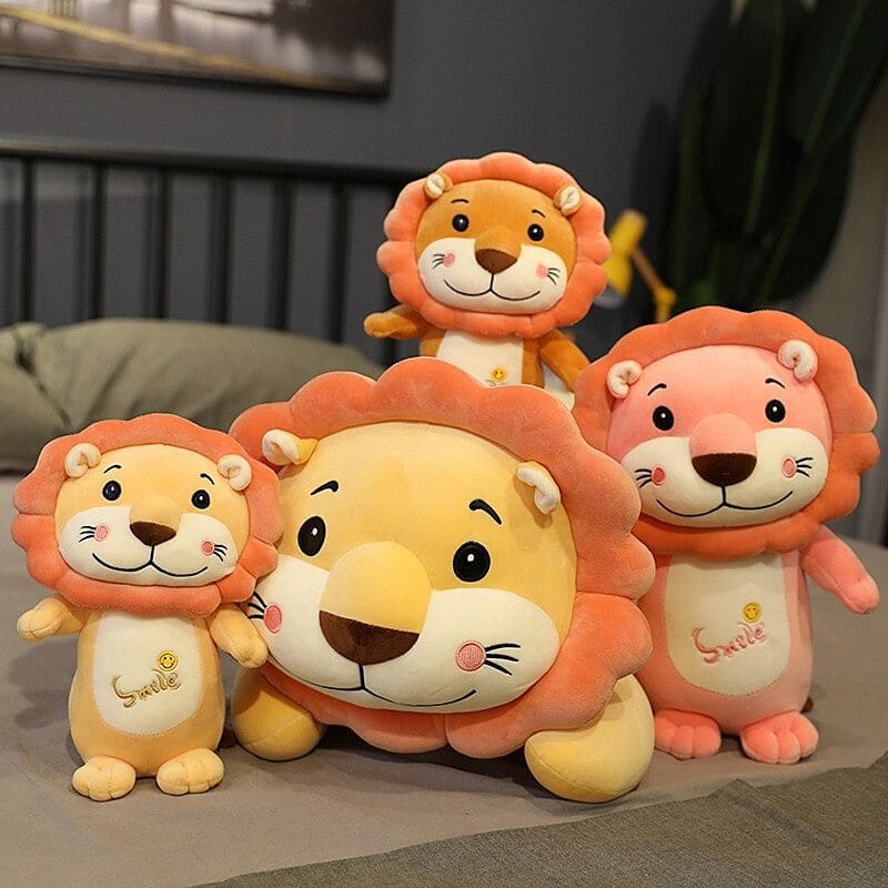 Doudou lion rose peluche.