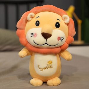 Doudou lion jaune sourire.