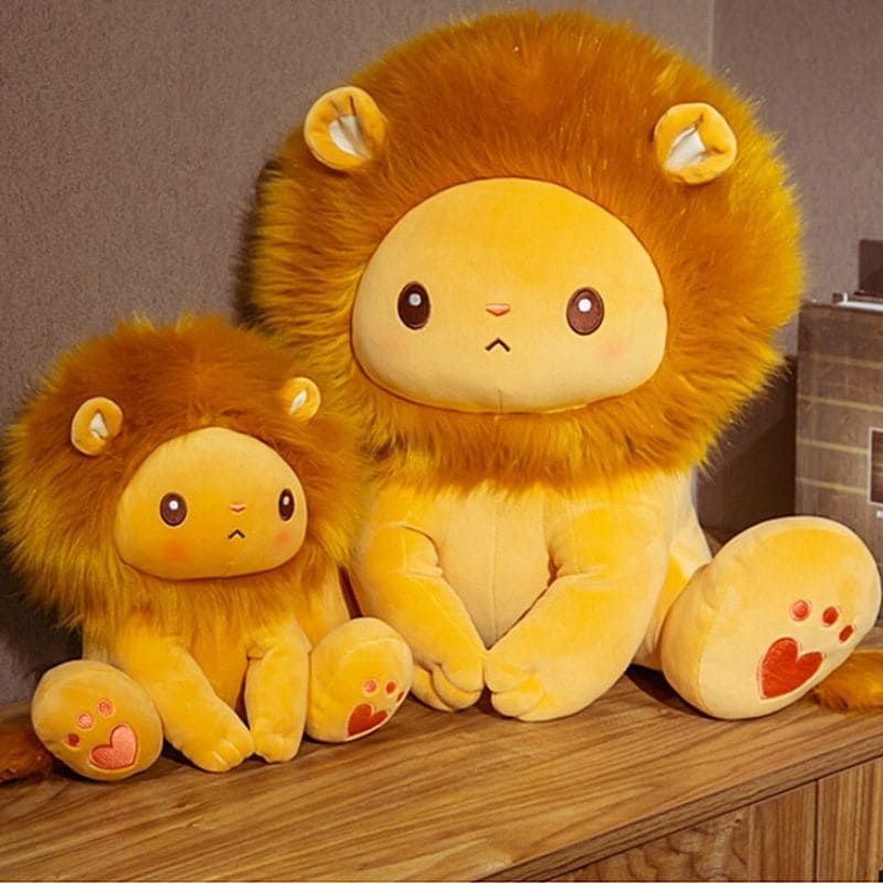 Doudou lion orange taille.