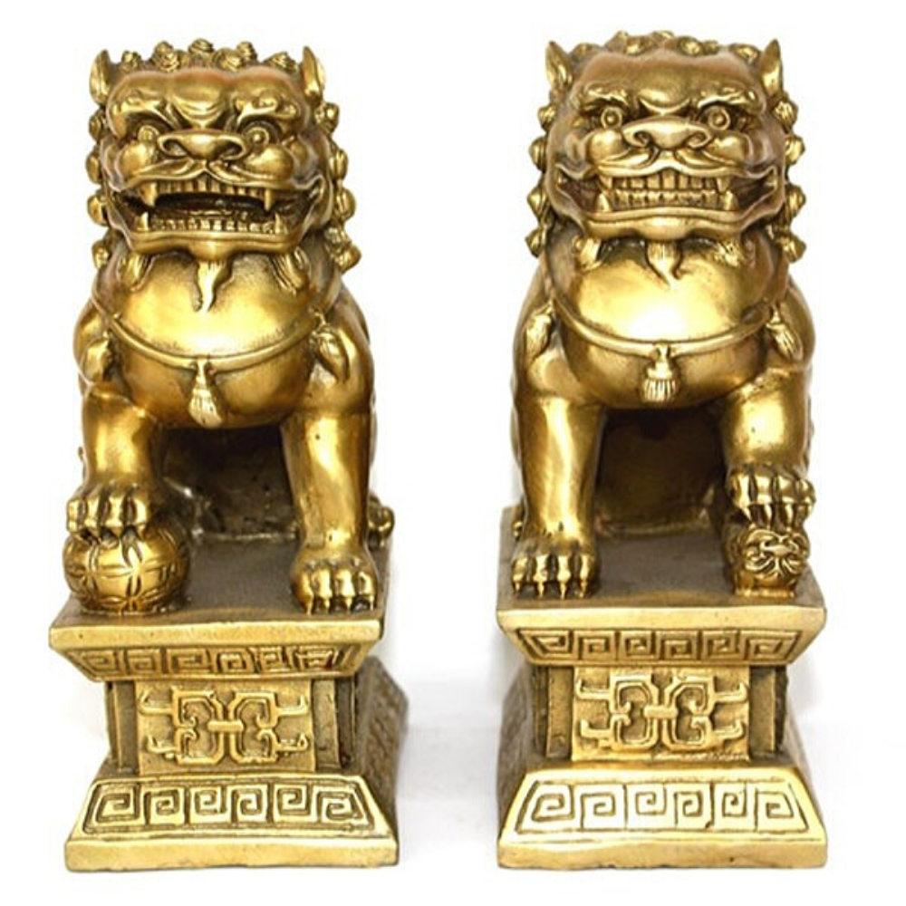 Couple statue lion chinois.