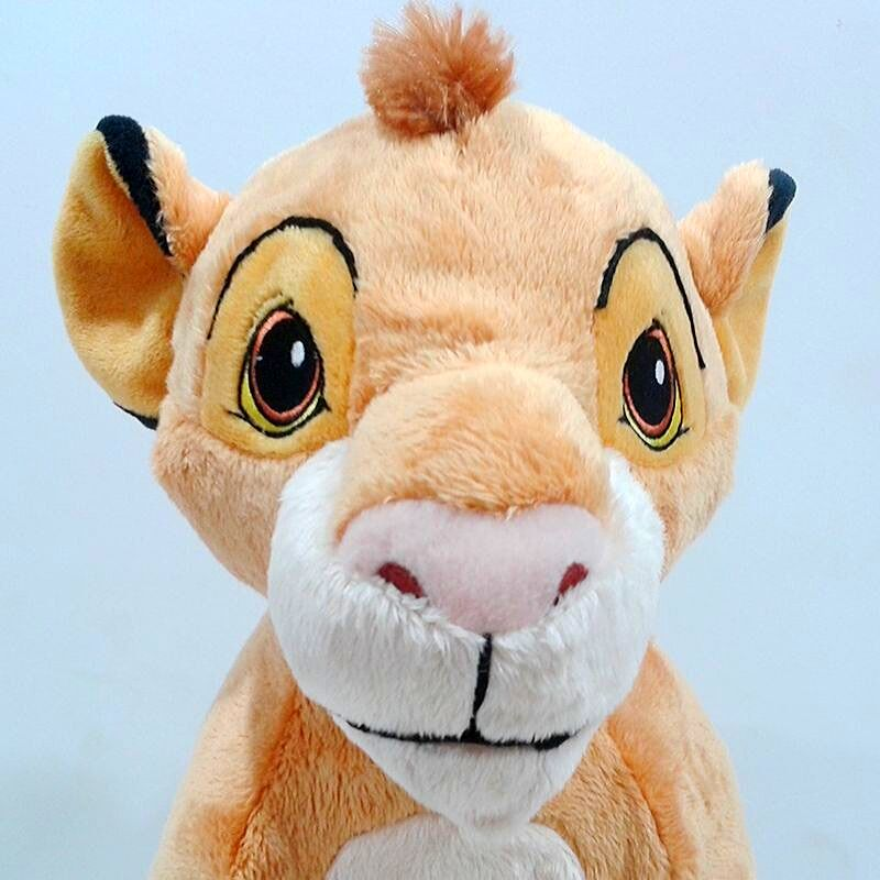 Doudou roi lion pour bébé.