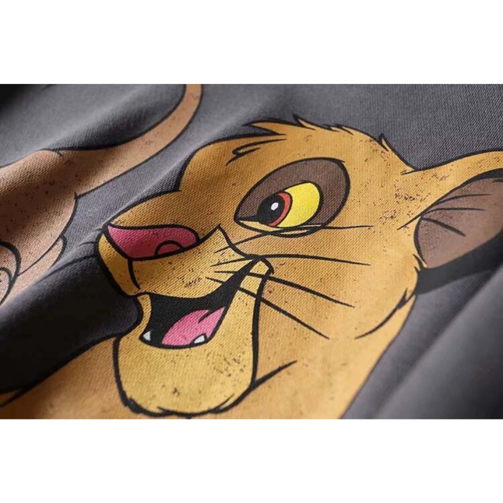 Tête de simba sur pull femme.