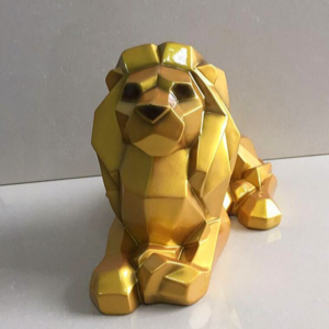 Statuette couché lion or.