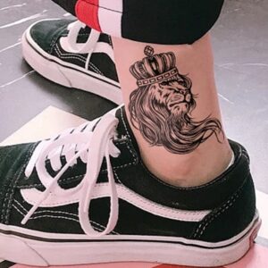 Tatouage Lion cheville.