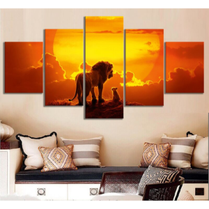 Toile avec lion couché de soleil orange.